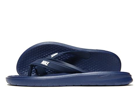 fake nike flip flops|nike flip flops men's.